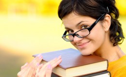 Portrait of girl with books