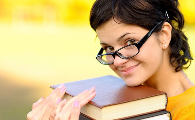 Portrait of girl with books